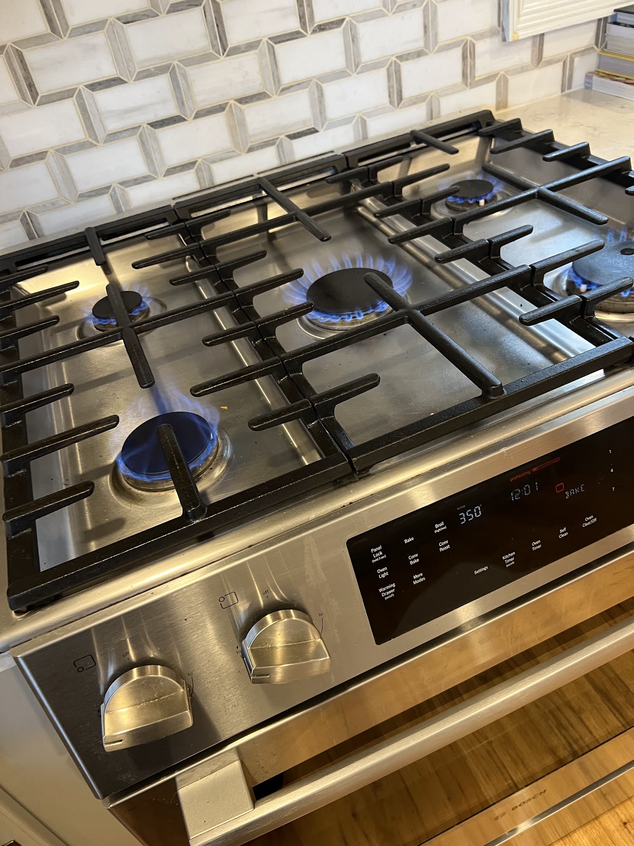 Gas range burners operating during a service check