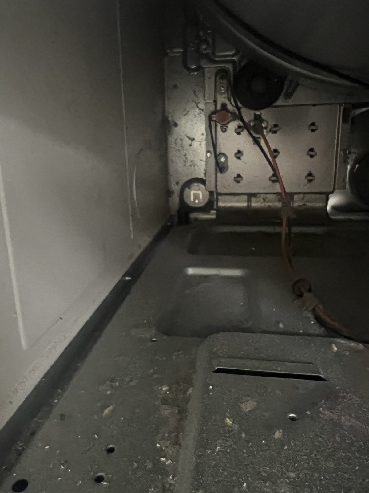 Internal components of a Speed Queen dryer exposed during service.